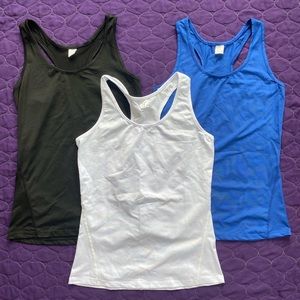 Size Small - 3 tanks tops 1 white, 1 black, 1 blue